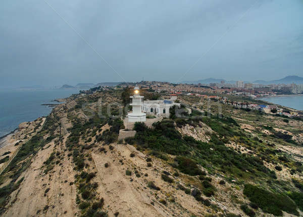 Lighthouse on a hilltop at early morning. Aerial photography.  Stock photo © amok