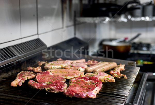 Assorted of a raw meat on the barbecue grill Stock photo © amok
