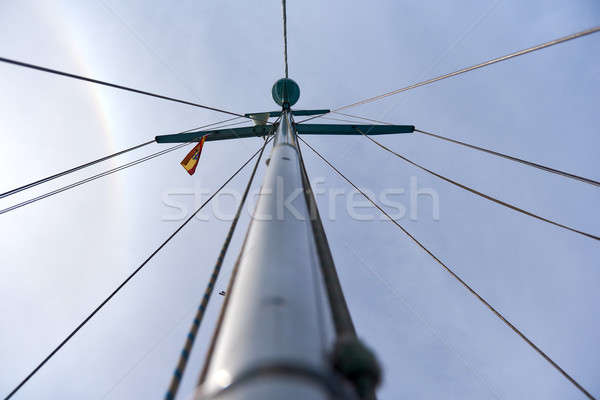 Mast of the sailing yacht against cloudy sky Stock photo © amok