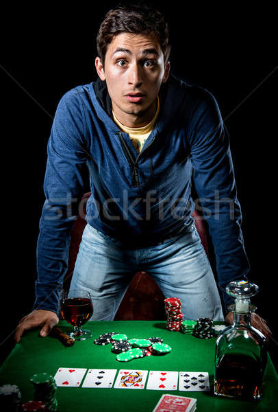 Young gambler indoors Stock photo © amok
