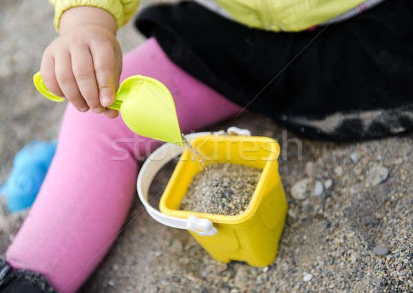 Bébé jouer plage plastique pelle [[stock_photo]] © amok