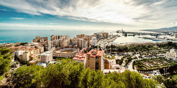 Picturesque view of Malaga bullring (La Malagueta) and seaport.  Stock photo © amok