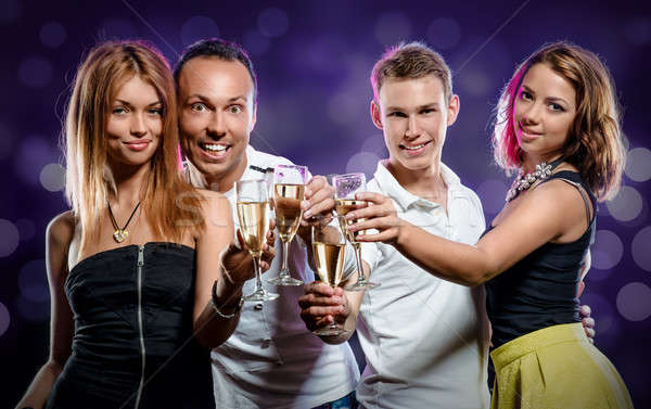 Groupe jeunes verres champagne [[stock_photo]] © amok