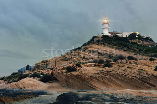 Lighthouse on a hilltop at early morning. Alicante, Costa Blanca Stock photo © amok