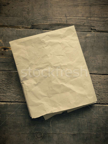 Crumpled paper on wood Stock photo © andreasberheide