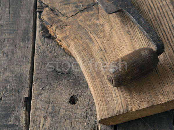 Stock photo: Old wood plane on oak plank
