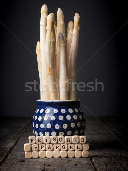 German words of Fresh asparagus on wooden dices Stock photo © andreasberheide
