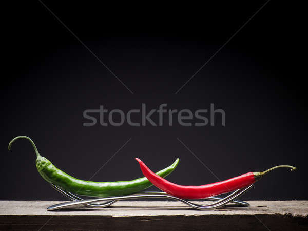 Two chilies on forks Stock photo © andreasberheide