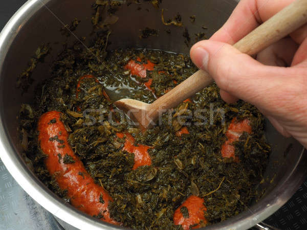 Cooked kale with smoked sausages Stock photo © andreasberheide