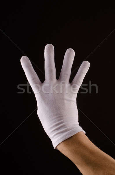 числа четыре мужчины стороны белый перчатки Сток-фото © andreasberheide