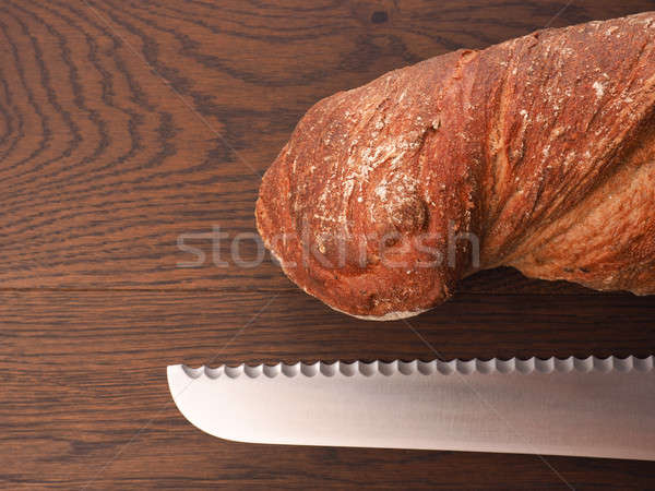 Organikus kenyér nagy kés finom fa asztal Stock fotó © andreasberheide