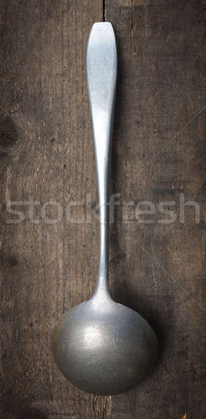 Old used soup spoon Stock photo © andreasberheide