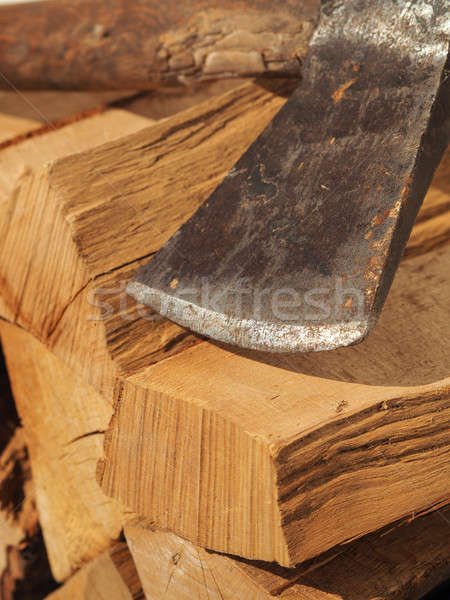 Stock photo: Fire wood with an old axe