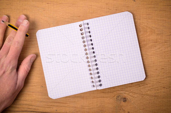 Férfi toll notebook kéz fa asztal ceruza Stock fotó © andreasberheide