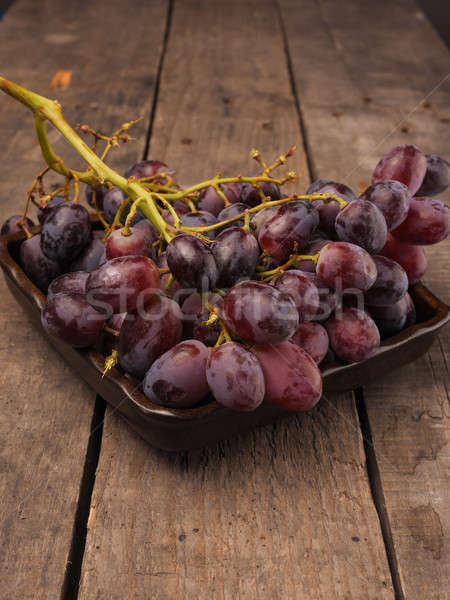 Red grapes in a bowl Stock photo © andreasberheide