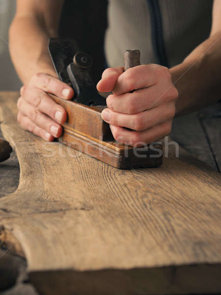 Wood working on an old plank Stock photo © andreasberheide