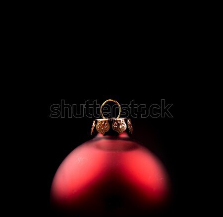 Old scratched Christmas bauble on a dark background Stock photo © andreasberheide