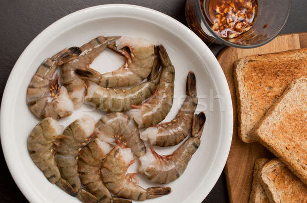 Noir tigre crevettes blanche plaque cuisine Photo stock © andreasberheide