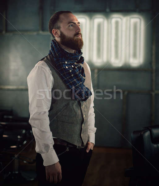 Handsome bearded man hipster with stylish beard. Stock photo © andreonegin