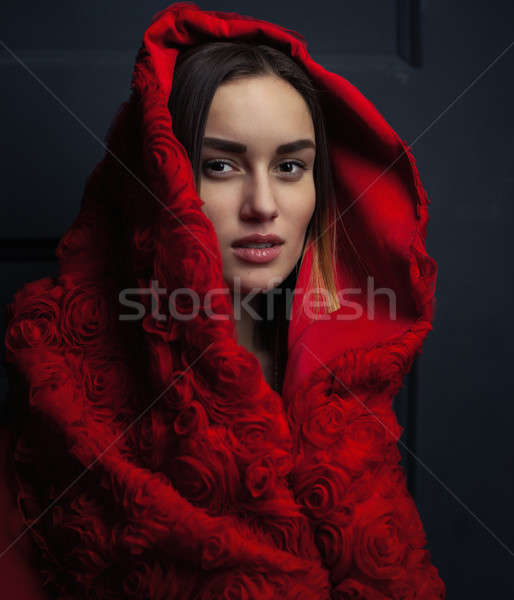 beautiful woman red cloak with red flowers roses in studio Stock photo © andreonegin