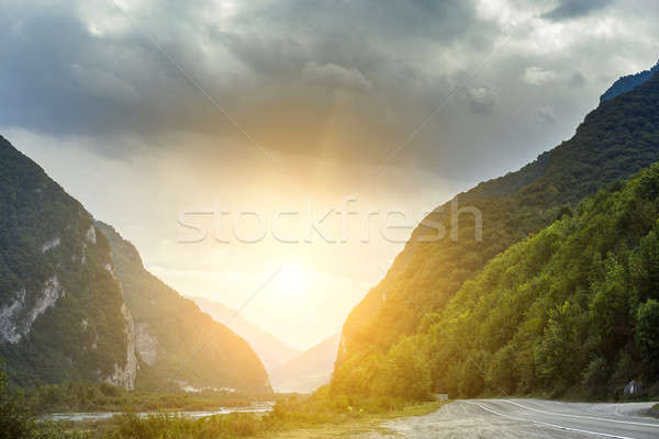 Cinematic road landscape. Road throuth the mountains Stock photo © andreonegin