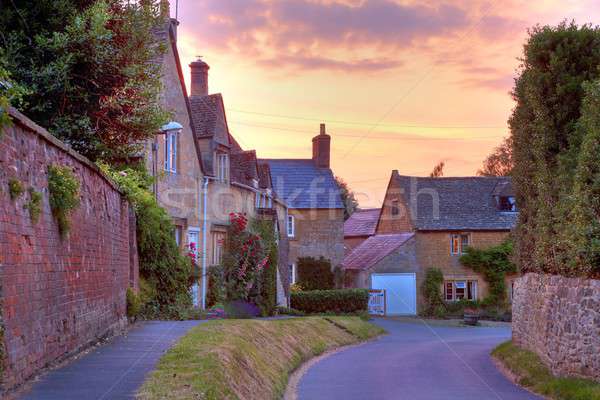 Cotswold cottages at sunset Stock photo © andrewroland