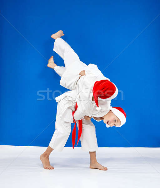 In caps of Santa Claus the athletes are training throws Stock photo © Andreyfire