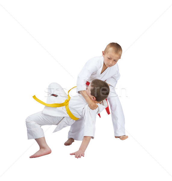 Throw judo in perfoming  the athlete with a red belt Stock photo © Andreyfire