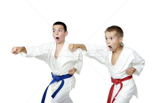 Two active athlete hit a punch arm Stock photo © Andreyfire