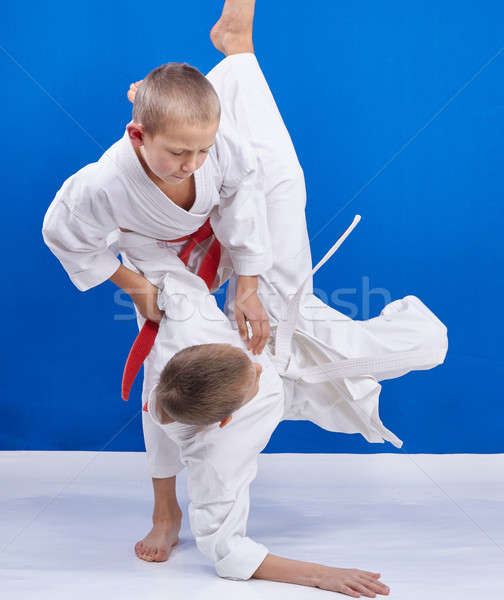 Boys are doing throws in judogi Stock photo © Andreyfire