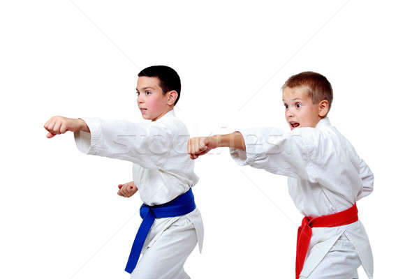 Punch hand athletes on a white background isolated Stock photo © Andreyfire