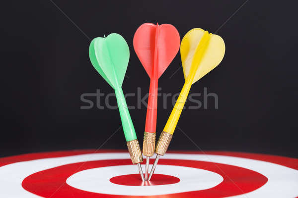 Closeup Of Darts On Target Stock photo © AndreyPopov