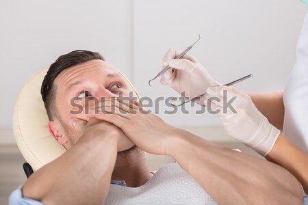 Man acupunctuur behandeling jonge man hand Stockfoto © AndreyPopov