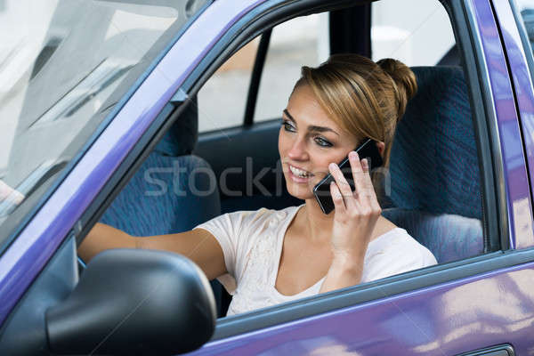 Stockfoto: Vrouw · mobiele · telefoon · rijden · auto · jonge · vrouw · telefoon