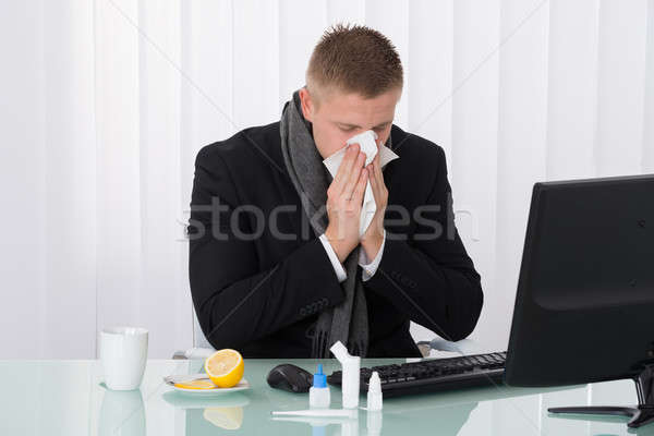 Krank Geschäftsmann Nase weht Büro Business Mann Stock foto © AndreyPopov