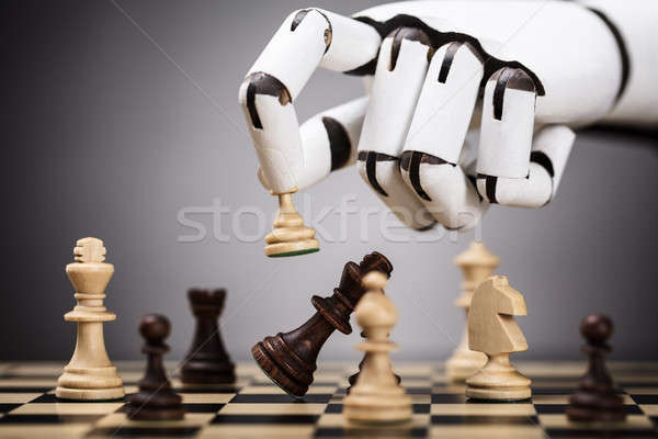 Stock photo: Robot Playing Chess