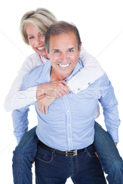 Stock photo: Mature Man Piggybacking His Wife
