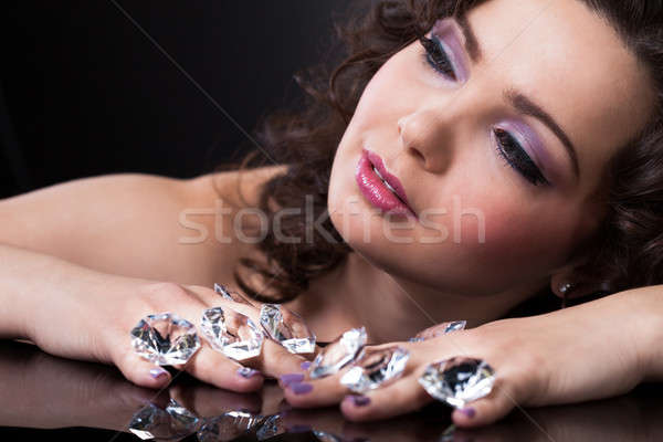 Fiatal nő tart gyémántok portré fiatal gyönyörű nő Stock fotó © AndreyPopov