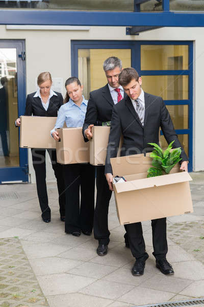 Disappointed Businesspeople With Cardboard Boxes Stock photo © AndreyPopov