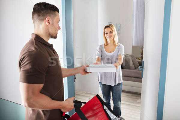 Man Delivering Pizza Stock photo © AndreyPopov