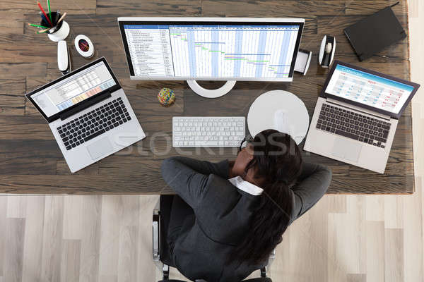 High Angle View Of Sleeping Businesswoman Stock photo © AndreyPopov