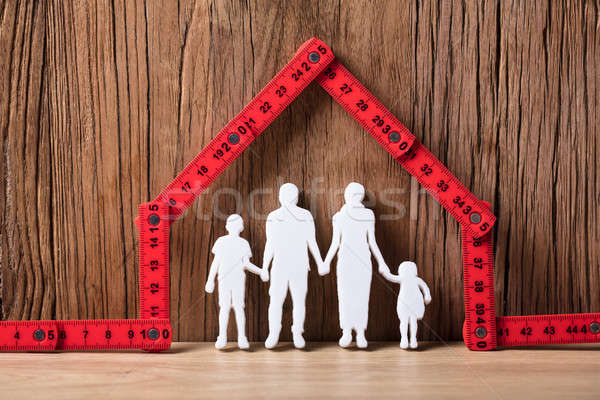 Family Holding Hands Under The House Stock photo © AndreyPopov