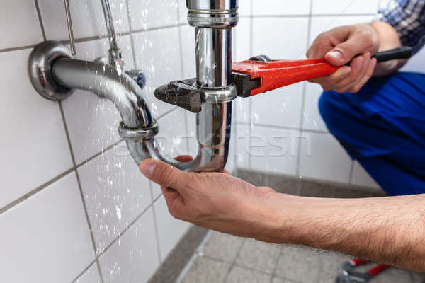 Plumber Repairing Sink Pipe Leakage Stock photo © AndreyPopov