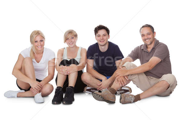 Stock photo: Happy friendly family relaxing