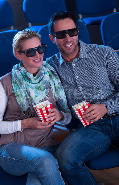 Lovely couple watching a 3d movie Stock photo © AndreyPopov