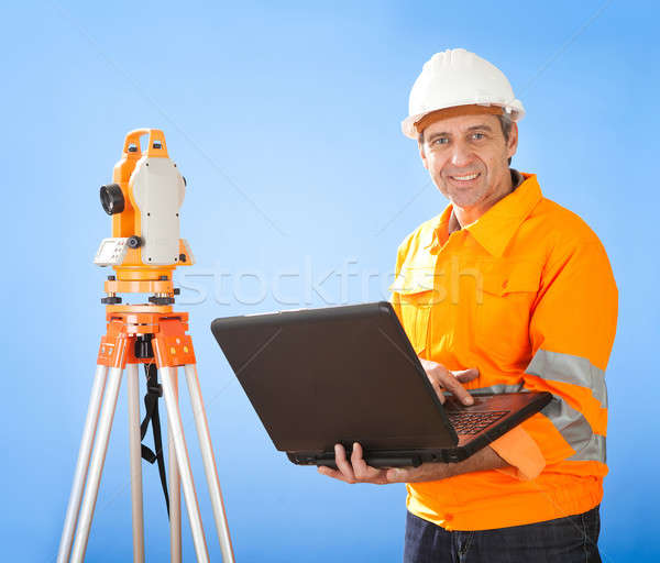 Senior land surveyor with theodelite Stock photo © AndreyPopov