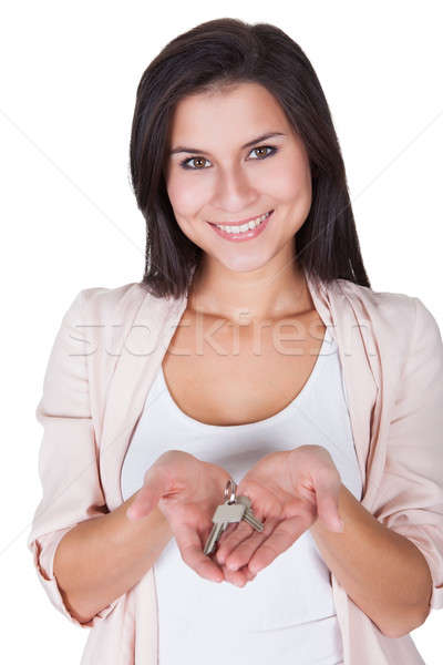 Smiling woman with a set of keys Stock photo © AndreyPopov