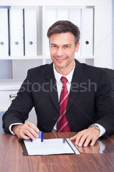 Smiling Mature Businessman Stock photo © AndreyPopov