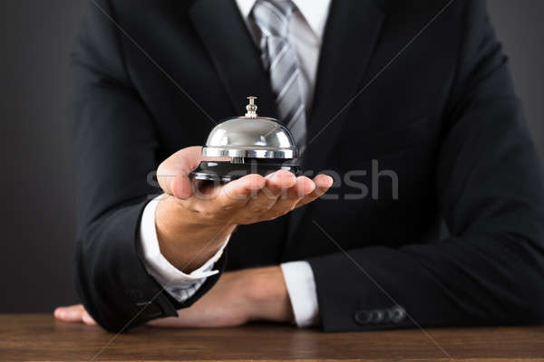 Businessperson Hands Holding Service Bell Stock photo © AndreyPopov
