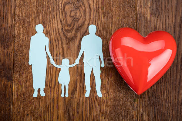 Stock photo: Family Paper Cut With Red Heart On Desk